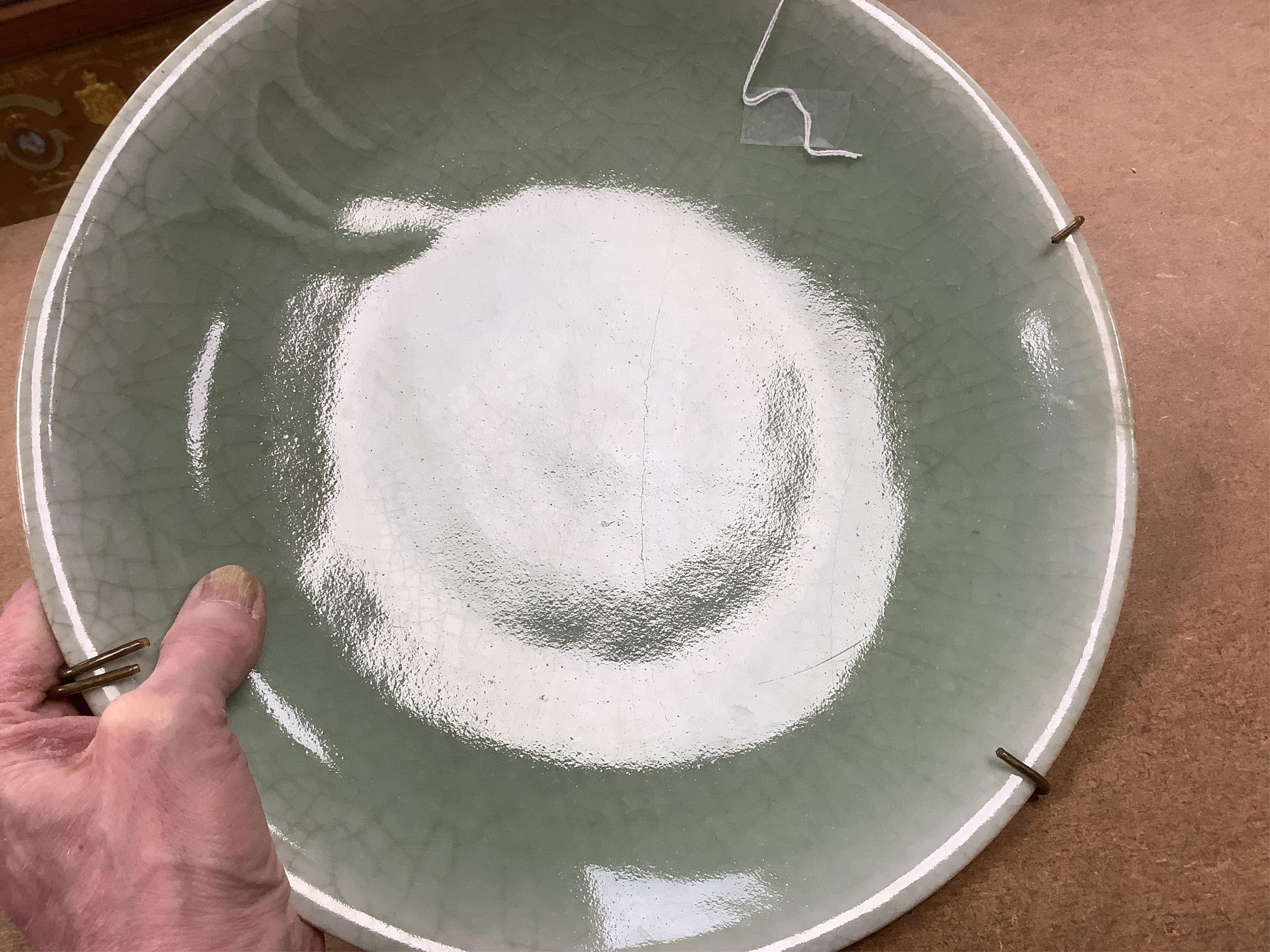 A Chinese celadon glazed dish, late Qing, 34cm in diameter